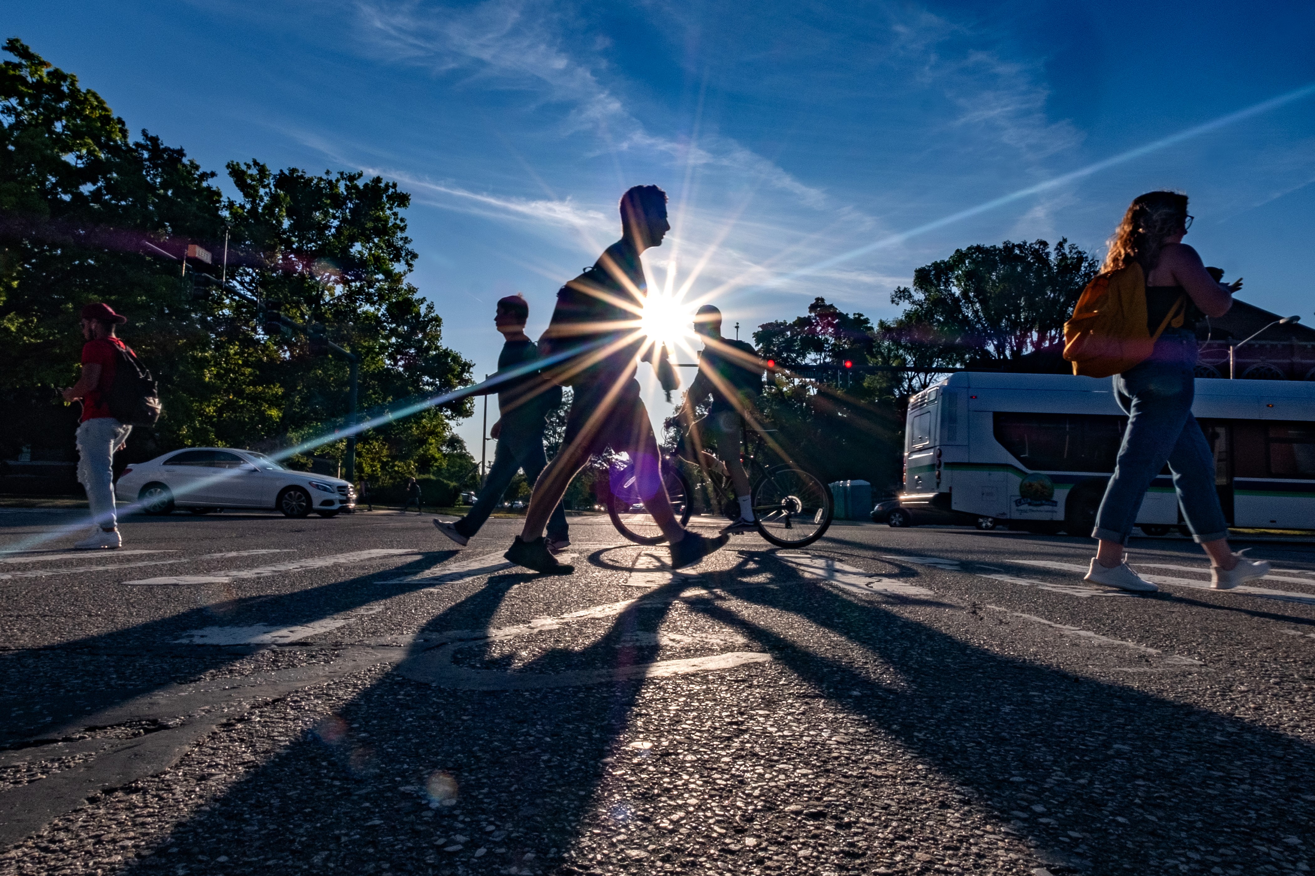 MSU-students-crosswalk-sun-flare