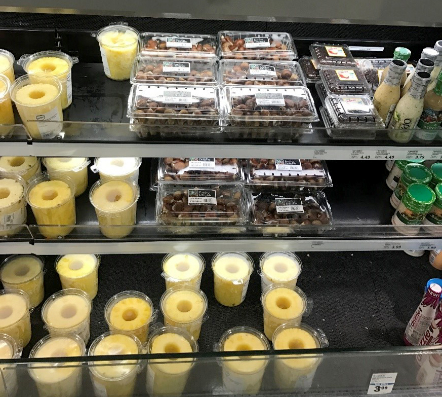 Chestnuts properly stored in a produce cooler at the grocery store