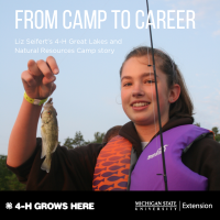 Liz Seifert catching a fish at camp in 2009.