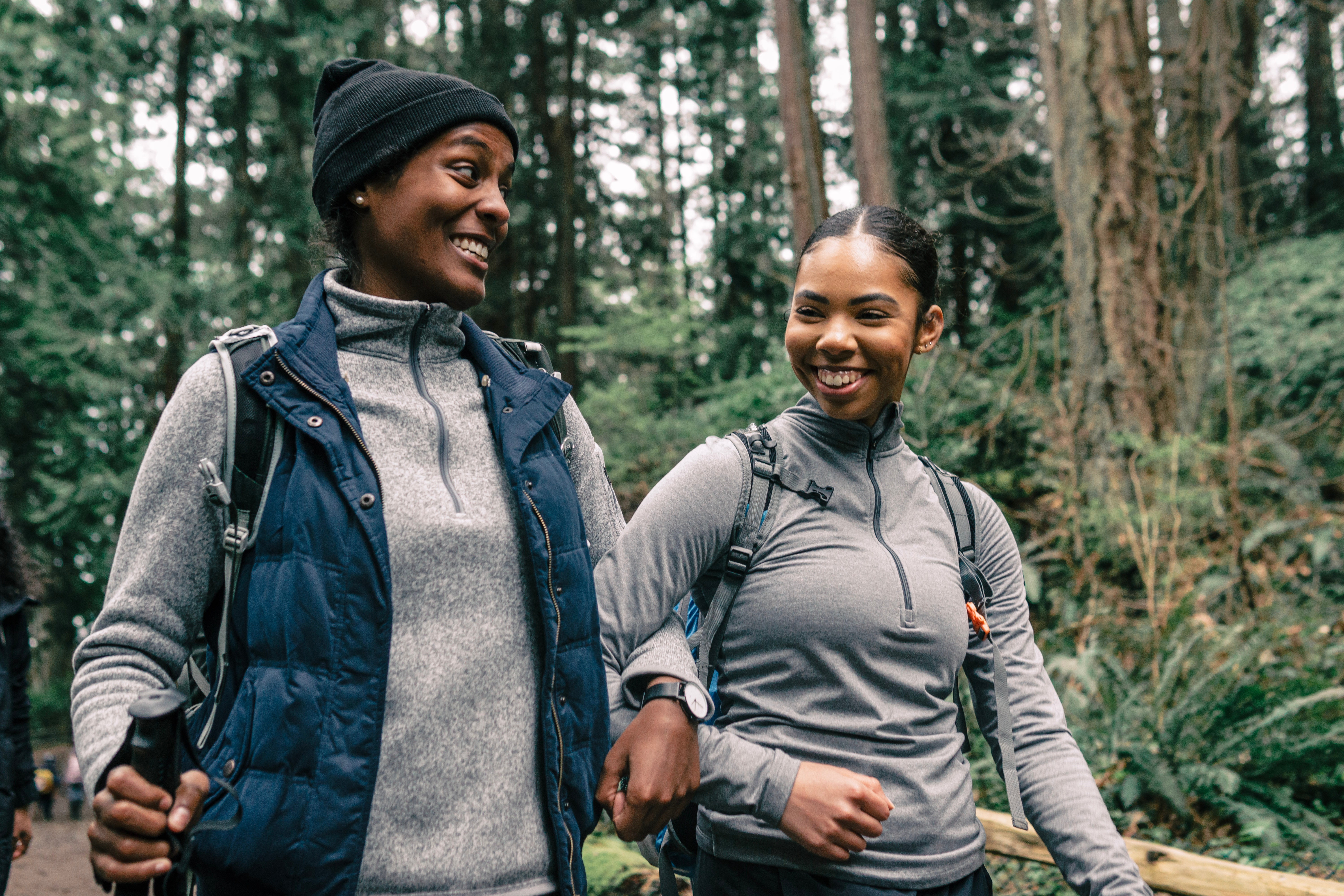 A picture of two women walking outside.