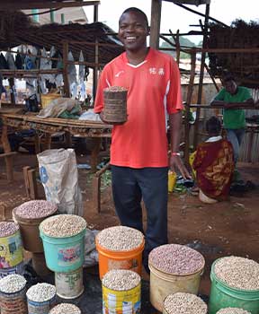 man standing at a market