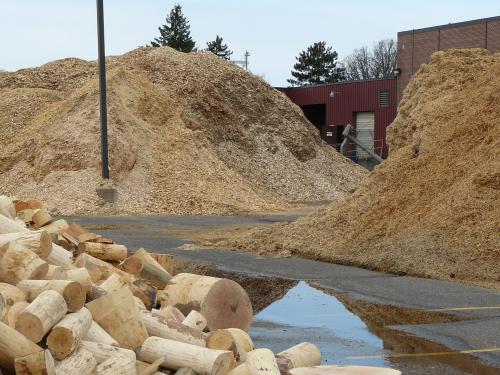 Three different feedstocks used to fire a district energy system that supplies heat and cooling to several buildings.  