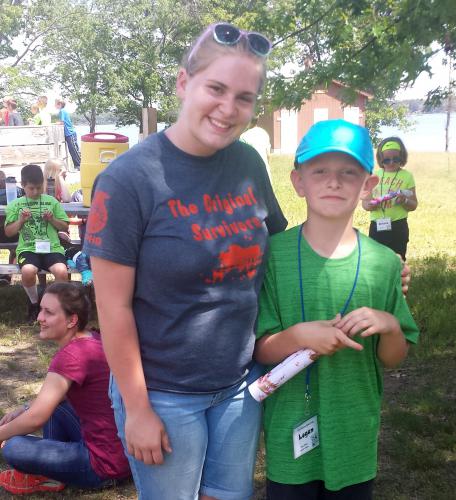 Miranda and a camper at 2017 North East Michigan 4-H Science Camp